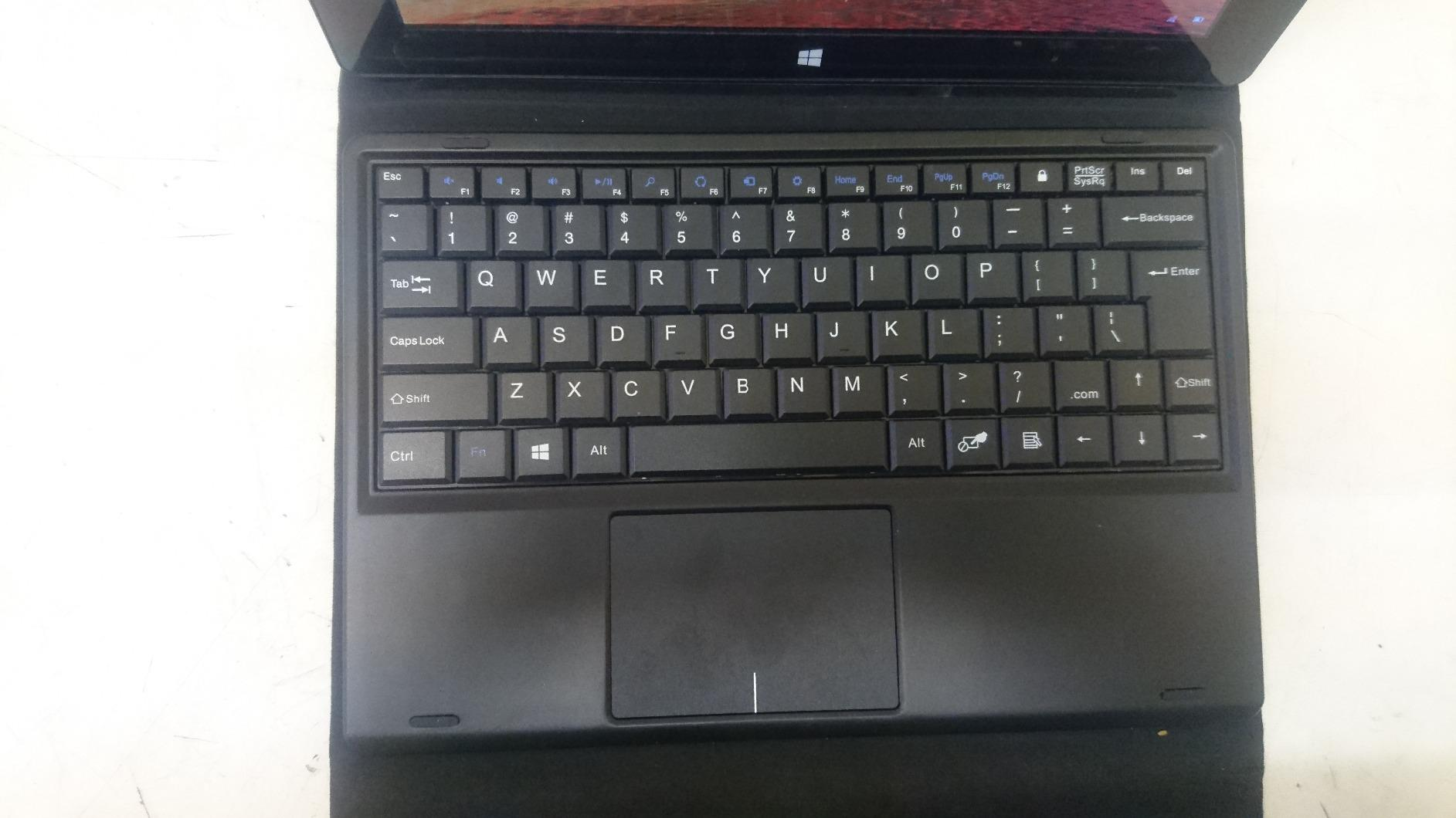 the keyboard types well connects fine and the track pad is good and I like ...